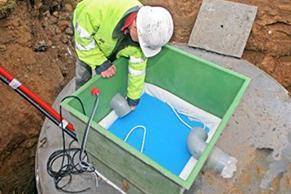 Installation de récupérateur et pompe à eau de pluie à Mouscron